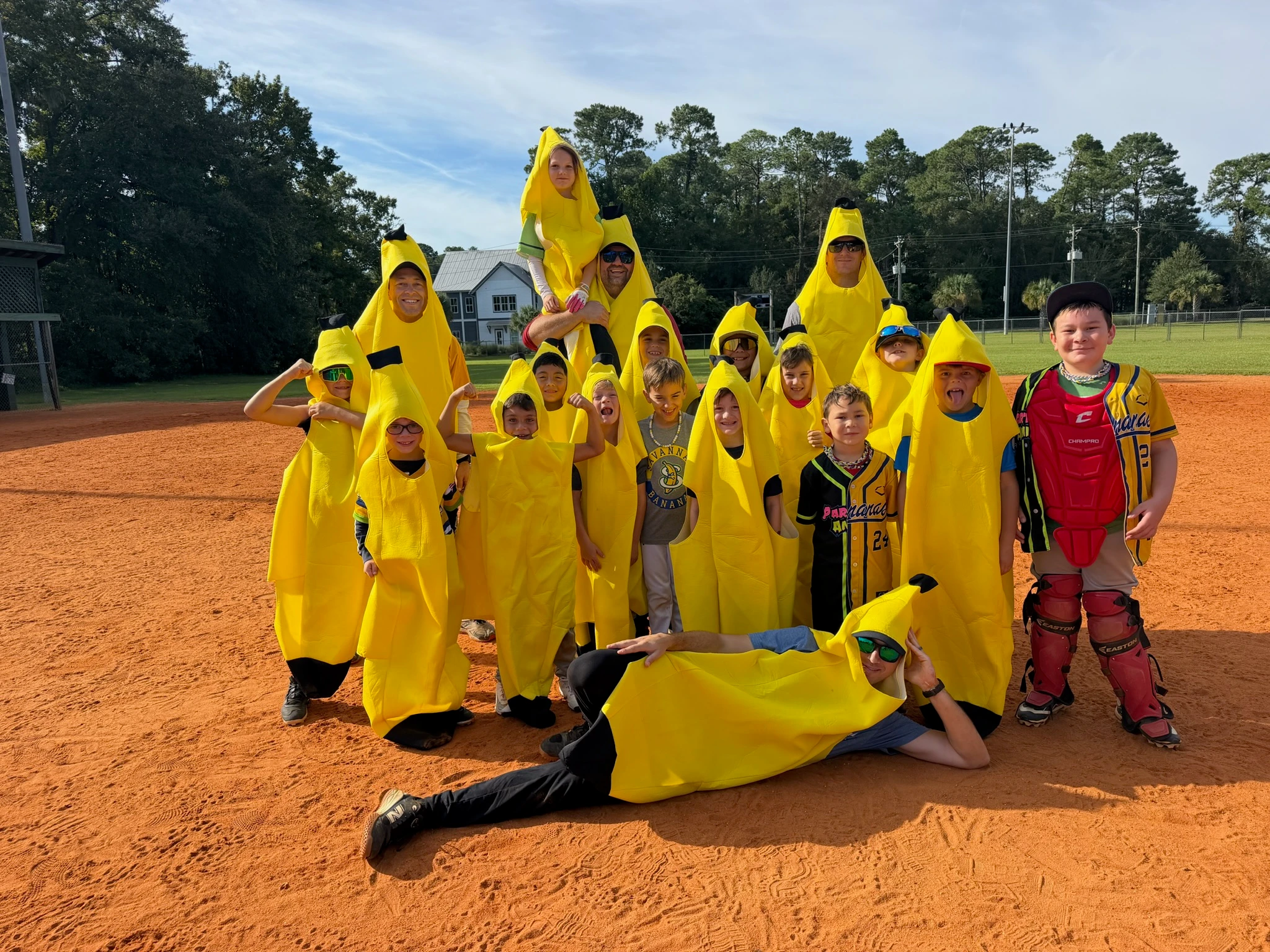 the whole team in banana costumes