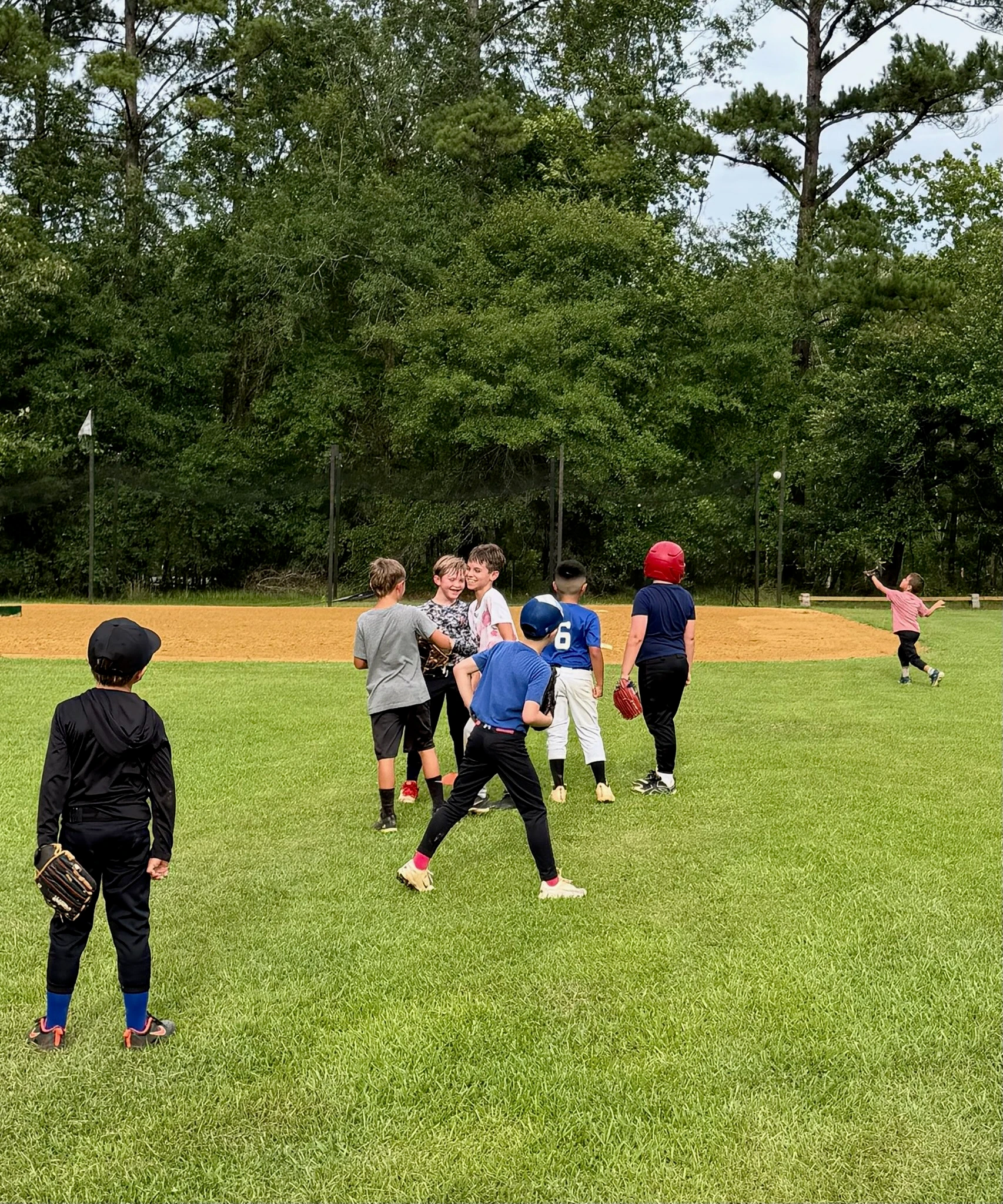 warming up with catch in the outfield